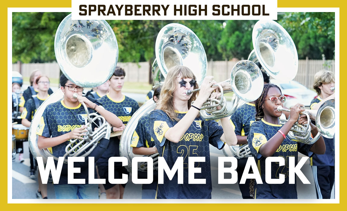 The horn section of the Sprayberry Band performing in the homecoming parade
